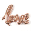 A giant rose gold letter balloon of "LOVE". perfect for engagement, bridal shower, wedding and birthday theme. romantic party decoration